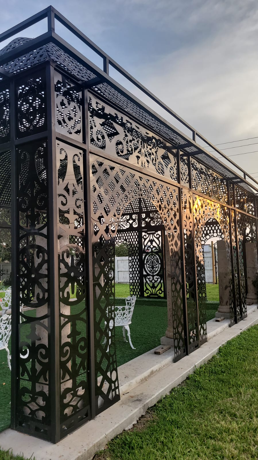 Residential and commercial aluminum panels with decorative overhead pattern