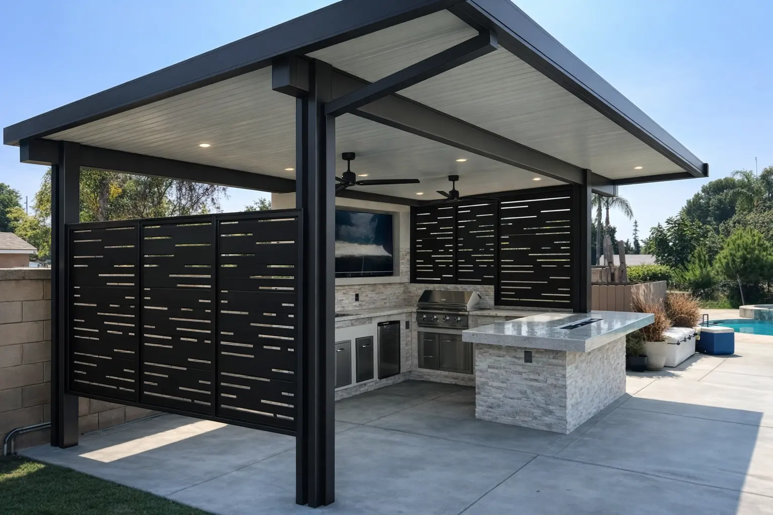 Outdoor kitchen with black privacy panels
